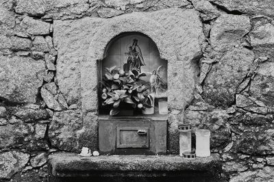 Low angle view of statue in cemetery