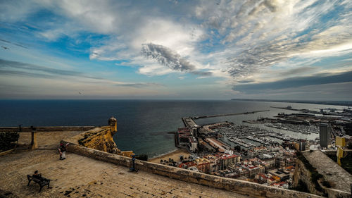 High angle view of pier on beach against sky