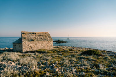 Scenic view of sea against clear sky