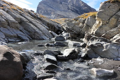 Mountain creek with daubenhorn in the backbround. leukerbad, switzerland. swiss alps.