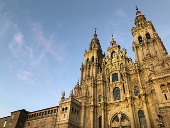 Low angle view of santiago de compostela cathedral against sky