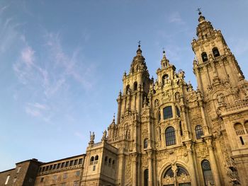 Low angle view of santiago de compostela cathedral against sky