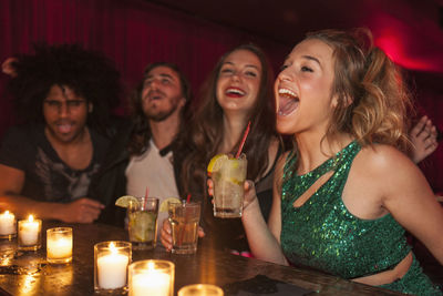 Friends hanging out at a nightclub