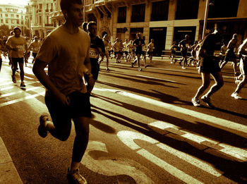 People walking on street in city