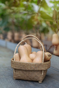 Close-up of fruits in basket on table