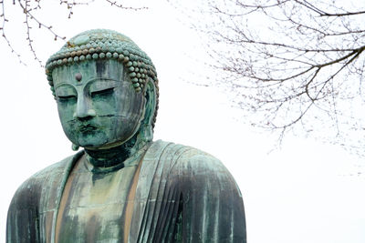 Close-up of statue against clear sky