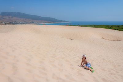 View of woman on beach