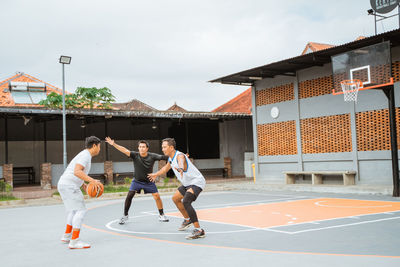 Basketball players playing basketball