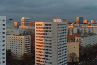 High angle view of buildings in city against sky