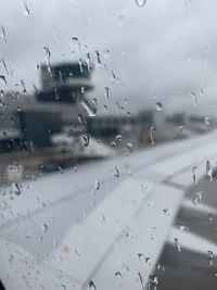 Full frame shot of wet glass window in rainy season