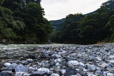 Scenic view of river stream against sky