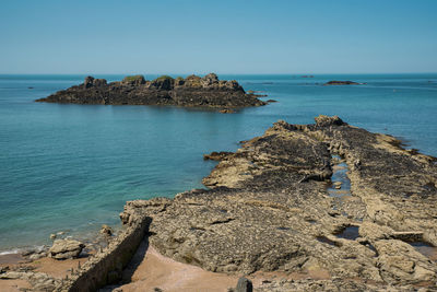 Scenic view of sea against clear sky