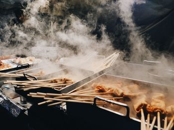 Close-up of meat on barbecue grill