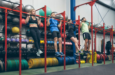 People exercising in gym