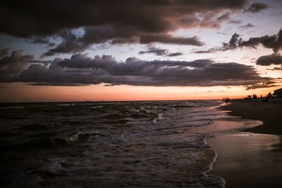 Scenic view of sea against sky at sunset