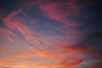 Low angle view of dramatic sky during sunset