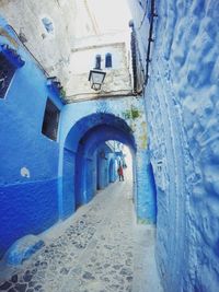 Narrow alley along buildings