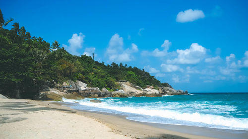 Scenic view of beach against sky