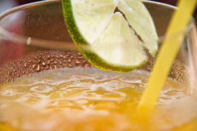 Close-up of orange juice in glass