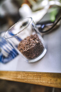 Close-up of coffee cup on table