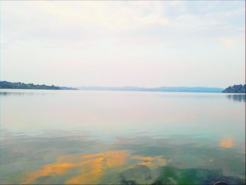 Scenic view of calm sea against sky