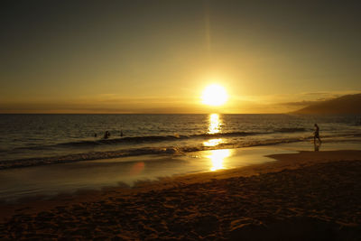 Scenic view of beach during sunset