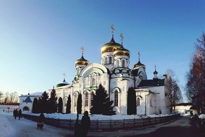 Facade of church against clear blue sky