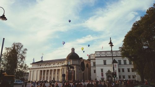 Low angle view of building against cloudy sky