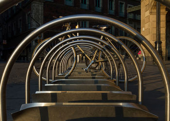 Bicycle in a bike rack in zócalo in mexico city, at dawn on empty streets