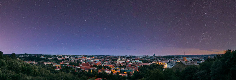 High angle view of townscape against sky at night