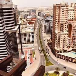 High angle view of street amidst buildings in city