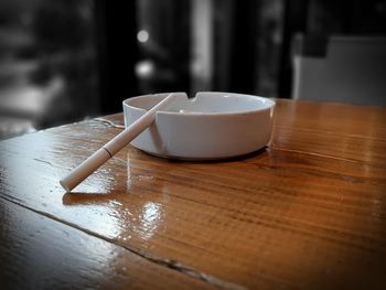 Cigarettes and wooden table