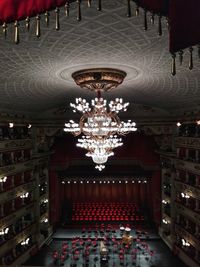 Low angle view of illuminated chandelier in building