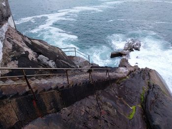 High angle view of rocks on shore