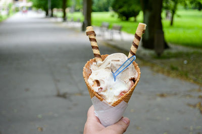 Close-up of woman holding ice cream