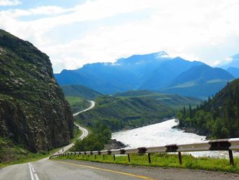 Country road leading towards mountains