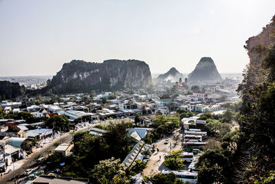 Panoramic view of trees and mountains against clear sky