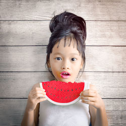 Portrait of woman holding ice cream