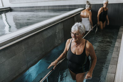 Senior woman in spa swimming-pool