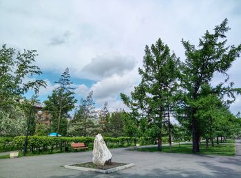 Sculpture in park against sky