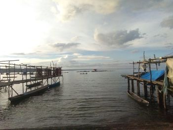 Pier on sea against sky