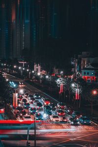 Traffic on city street at night