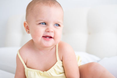 Portrait of cute baby boy at home