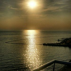 Scenic view of sea at sunset