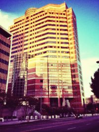 Low angle view of modern buildings against sky