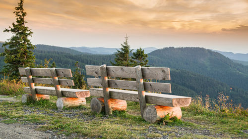 Benches with a view over hazy hills