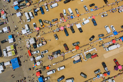High angle view of people on street against buildings in city