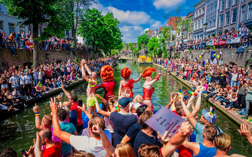 Colorful gay pride parade in utrecht nl with blue sky