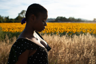 Woman standing on field