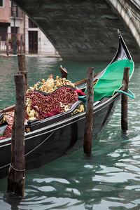 Gondola on the grand canal in venice, italy, close to the rialto bridge